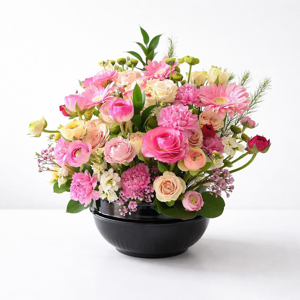Premium pink and cream rose arrangement with ranunculus and gerbera โ Carlsbad flower delivery