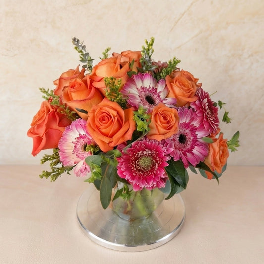 Extra full size orange rose and pink gerbera vase arrangement in clear glass vase – Oceanside flower delivery