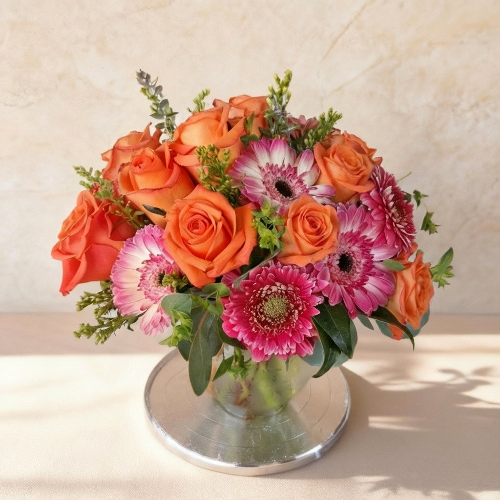 Premium orange rose and pink gerbera vase arrangement in clear glass vase – Oceanside flower delivery