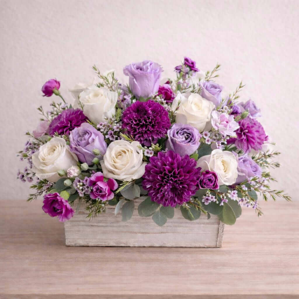 Lavender Flower Arrangement in a charming garden box with mixed purple and white flowers.