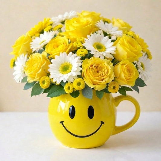 Extra full size cheerful yellow bouquet with roses, daisies, and mixed flowers arranged in a yellow smiley mug — fresh flowers Oceanside CA.