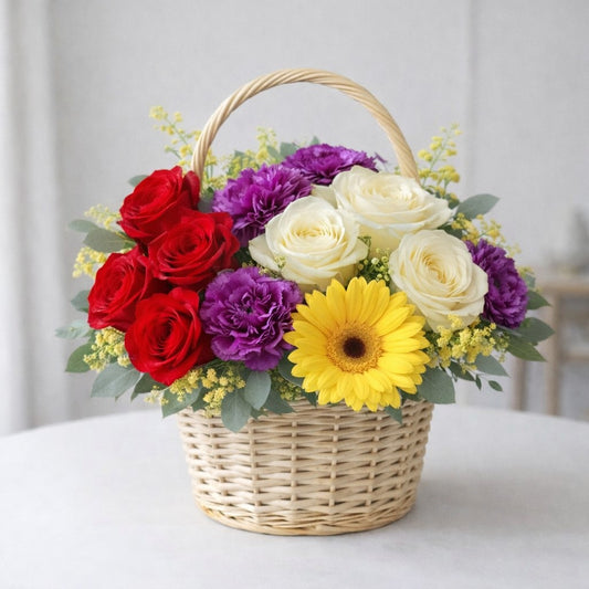 Radiant flower basket with red roses, ivory roses, yellow gerbera daisy and purple carnations – Vista flower delivery