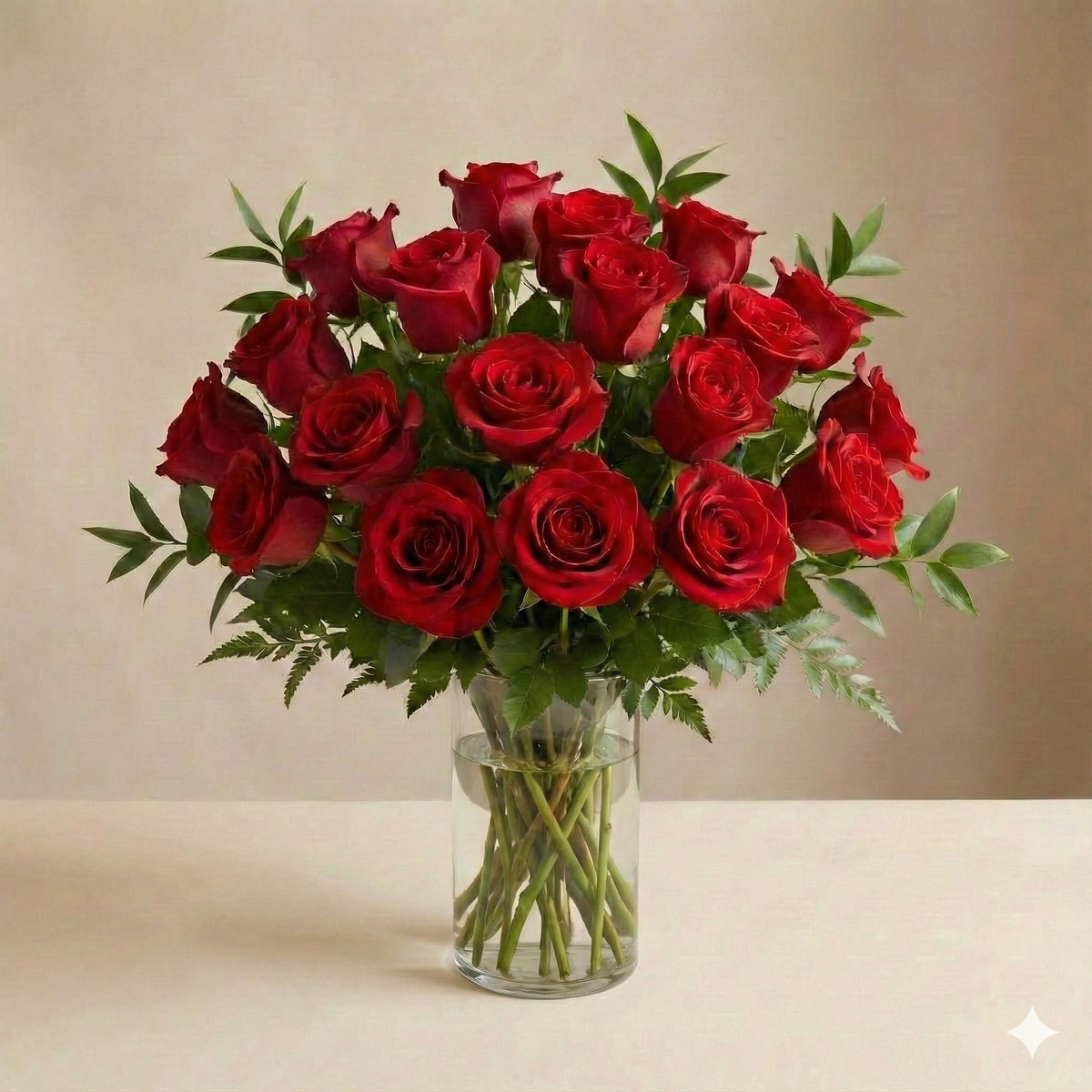 Premium red rose vase arrangement with full, rounded design and Italian ruscus greenery, handcrafted by a local florist – Encinitas flower delivery