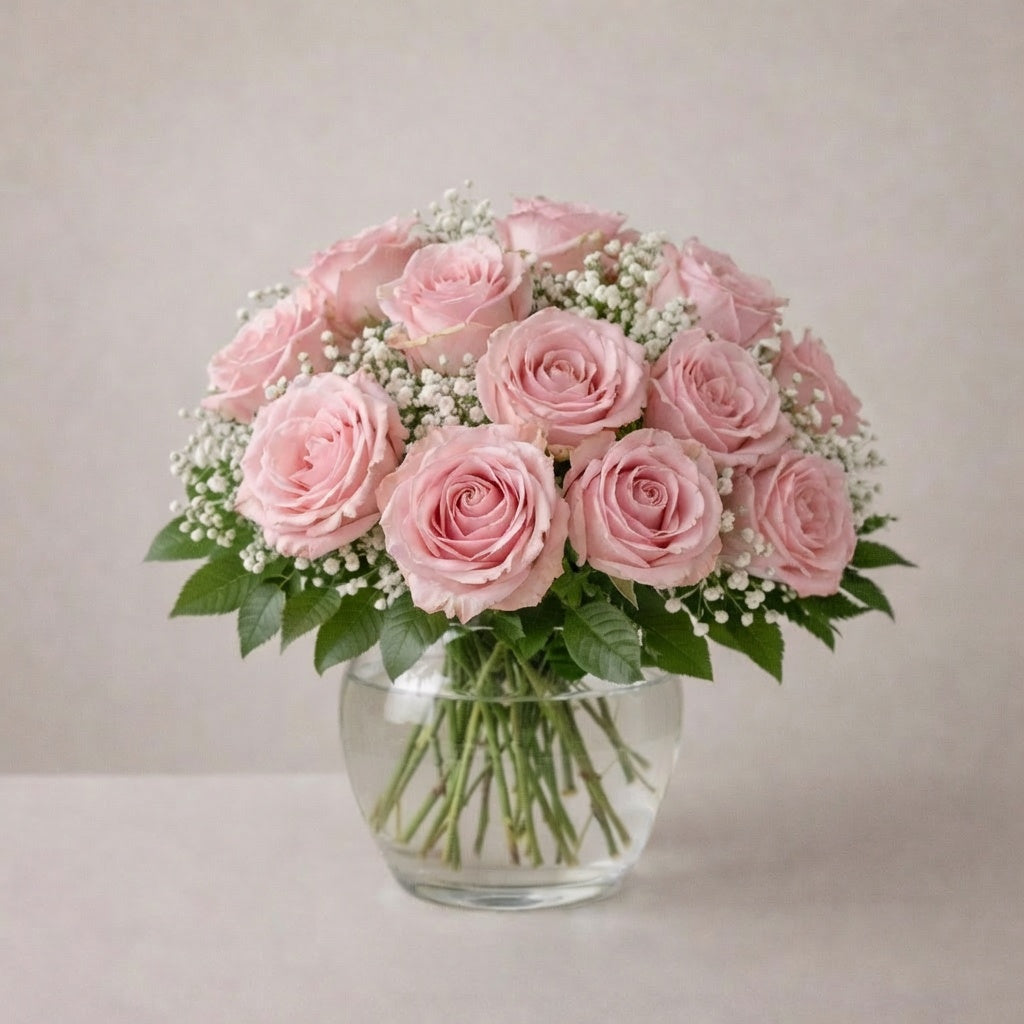 Elegant blush rose bouquet featuring 18 premium blush pink roses arranged in a clear vase – San Marcos flower 