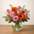 Sunset Harmony Bouquet arrangement displayed on a table