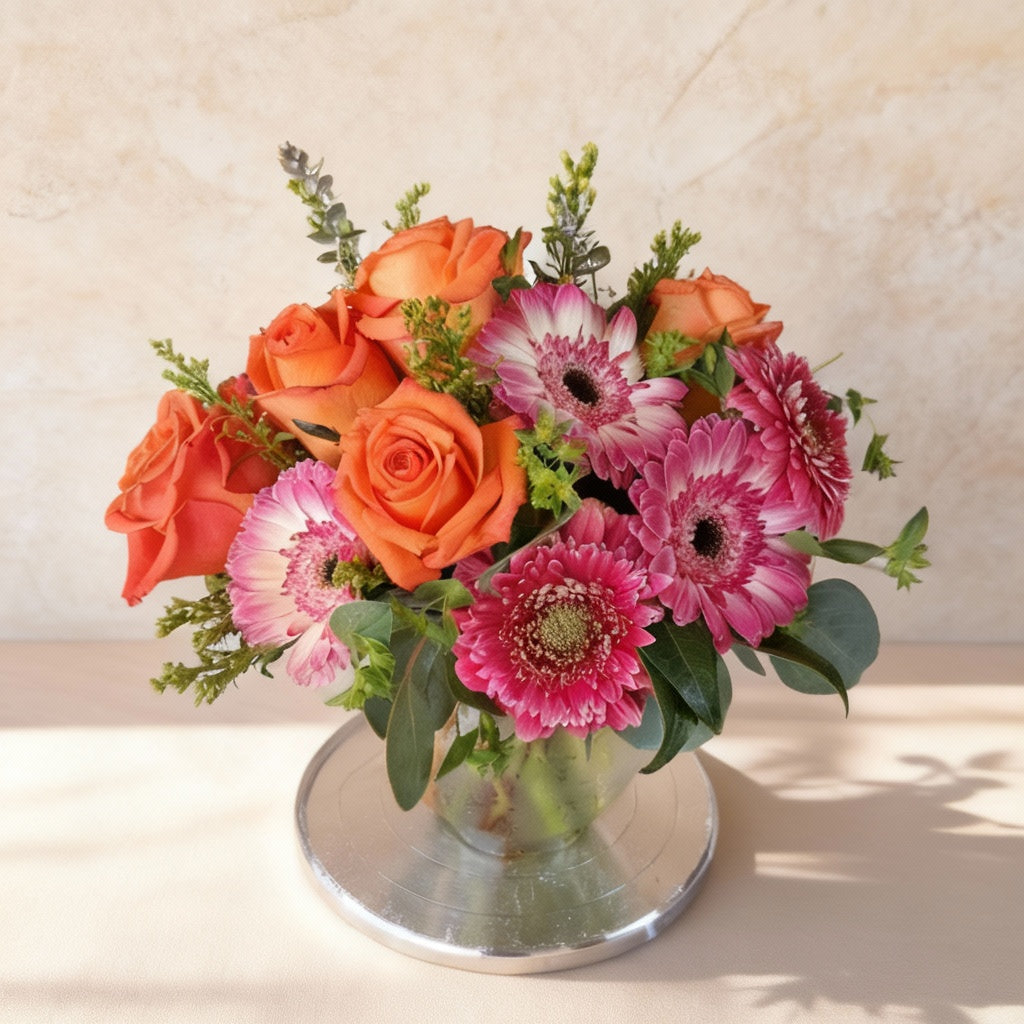 Regular orange rose and pink gerbera vase arrangement with fuller design – Oceanside flower delivery