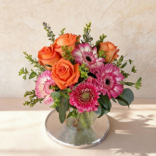 Regular size orange rose and pink gerbera vase arrangement by Thanks Flowers – Oceanside flower delivery
