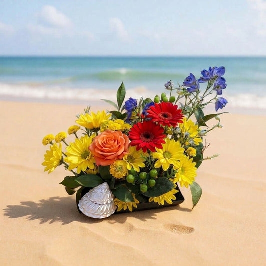 Tropical bouquet with shell featuring vibrant flowers and turban shell