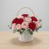 Blush & Red Rose Basket close-up showing eucalyptus greenery and baby&