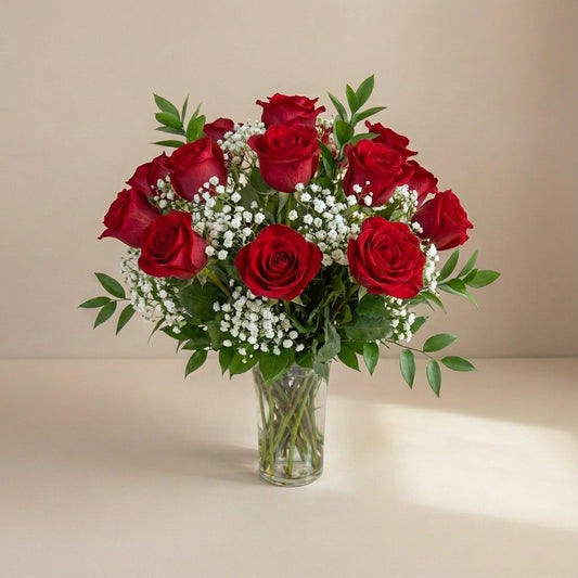 Classic red rose vase arrangement with lush greenery, handcrafted floral design in a clear glass vase – San Marcos flower delivery